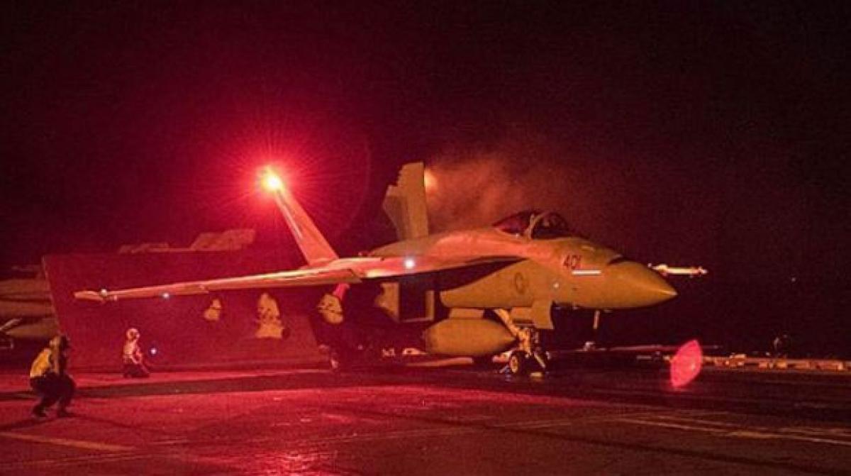 Iranian navy test fires rockets near US carrier